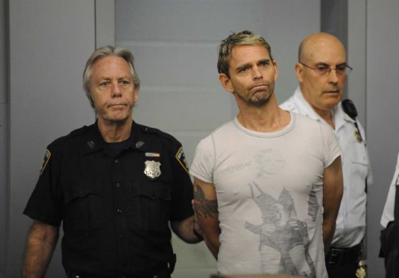 Brett C. Knight is shown at his 2013 arraignment in Central Islip Criminal Court. Photo Credit: Pool 