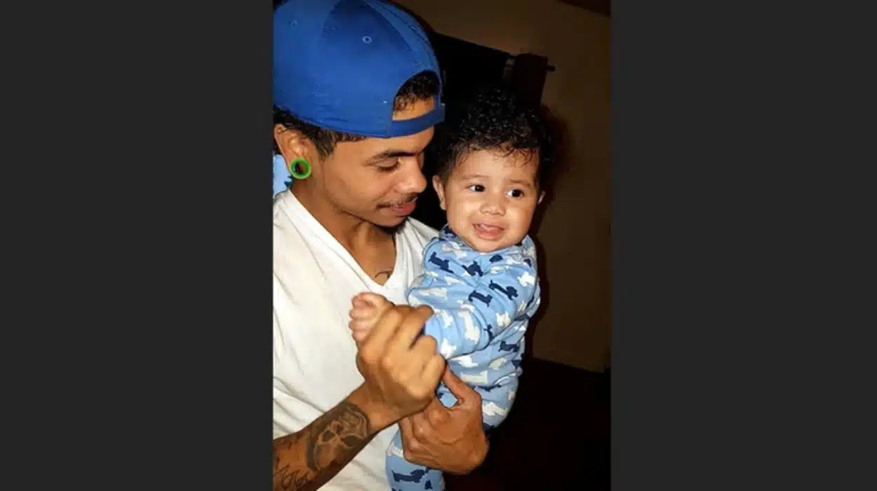 dwi E-bike victim Joseph Melendez, of Wyandanch, holds his son Giovanni, who is now 7 years old, in an undated photo. Credit: Emeli Rivera