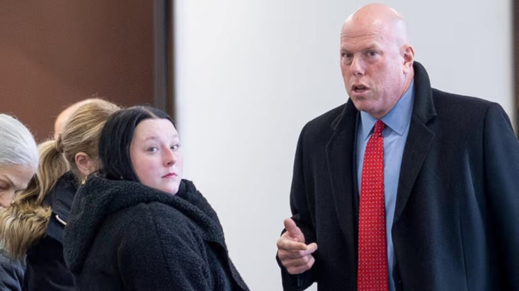 Jennifer Kirkpatrick with her attorney, Michael Brown, outside state Supreme Court Justice John Collins' courtroom in Riverhead on Wednesday. Credit: Michael A. Rupolo Sr.